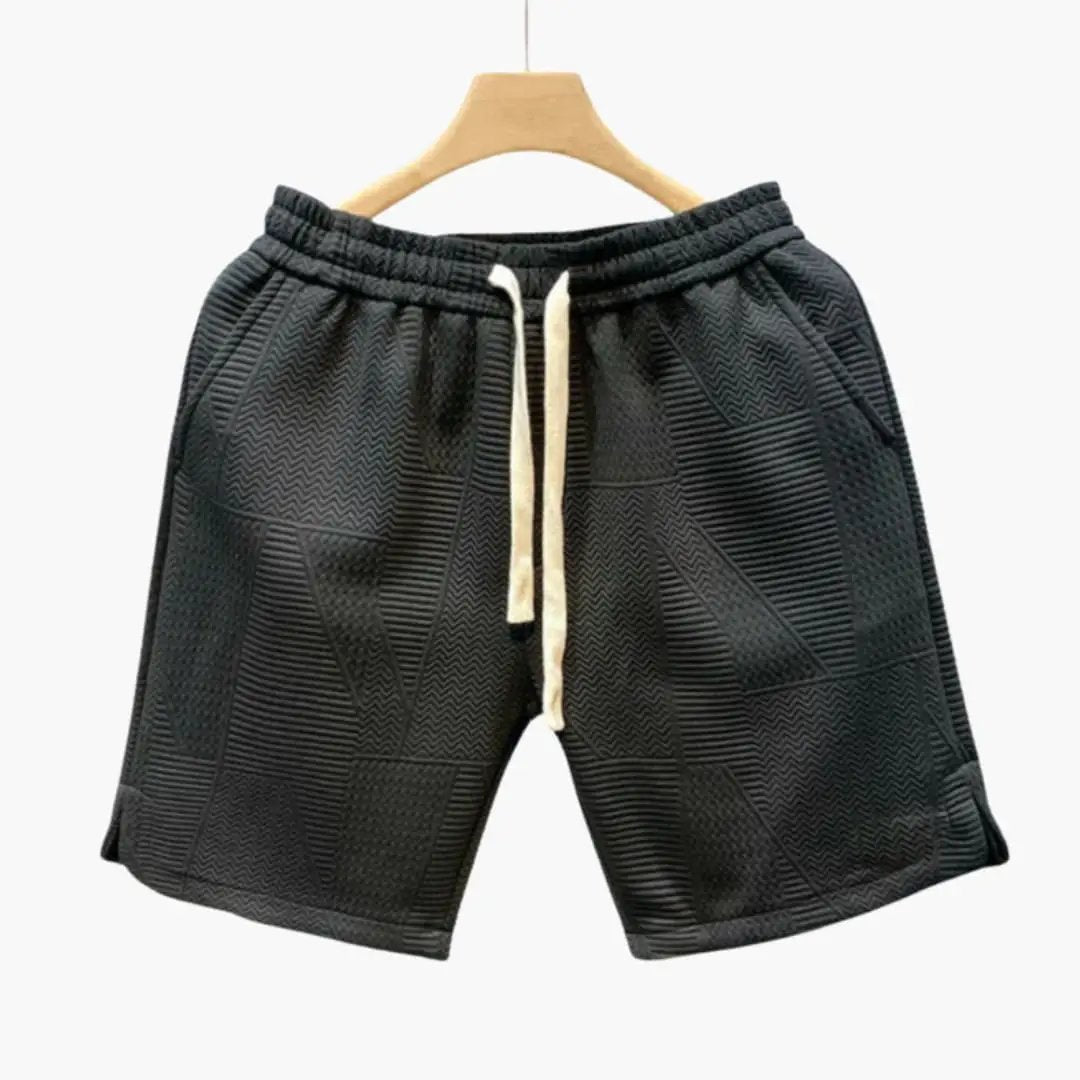 Men's Wilfred Smith jogger shorts, black textured fabric with elastic waistband and cream drawstring