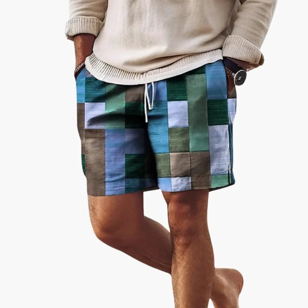 Men’s Swim Shorts with elastic waistband in a multicolor block pattern by Wilfred Smith boardshorts