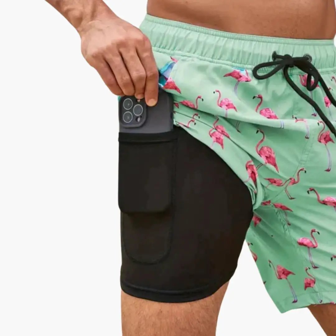 Men’s swim trunks mint green flamingo print with drawstring waist and side pocket