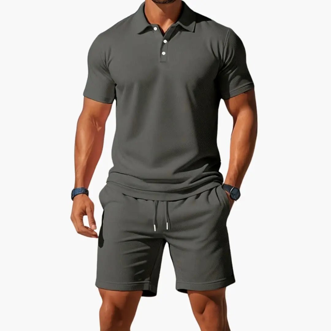 Men’s Two-Piece Polo Short Set by Wilfred Smith: charcoal gray collared polo with matching shorts.
