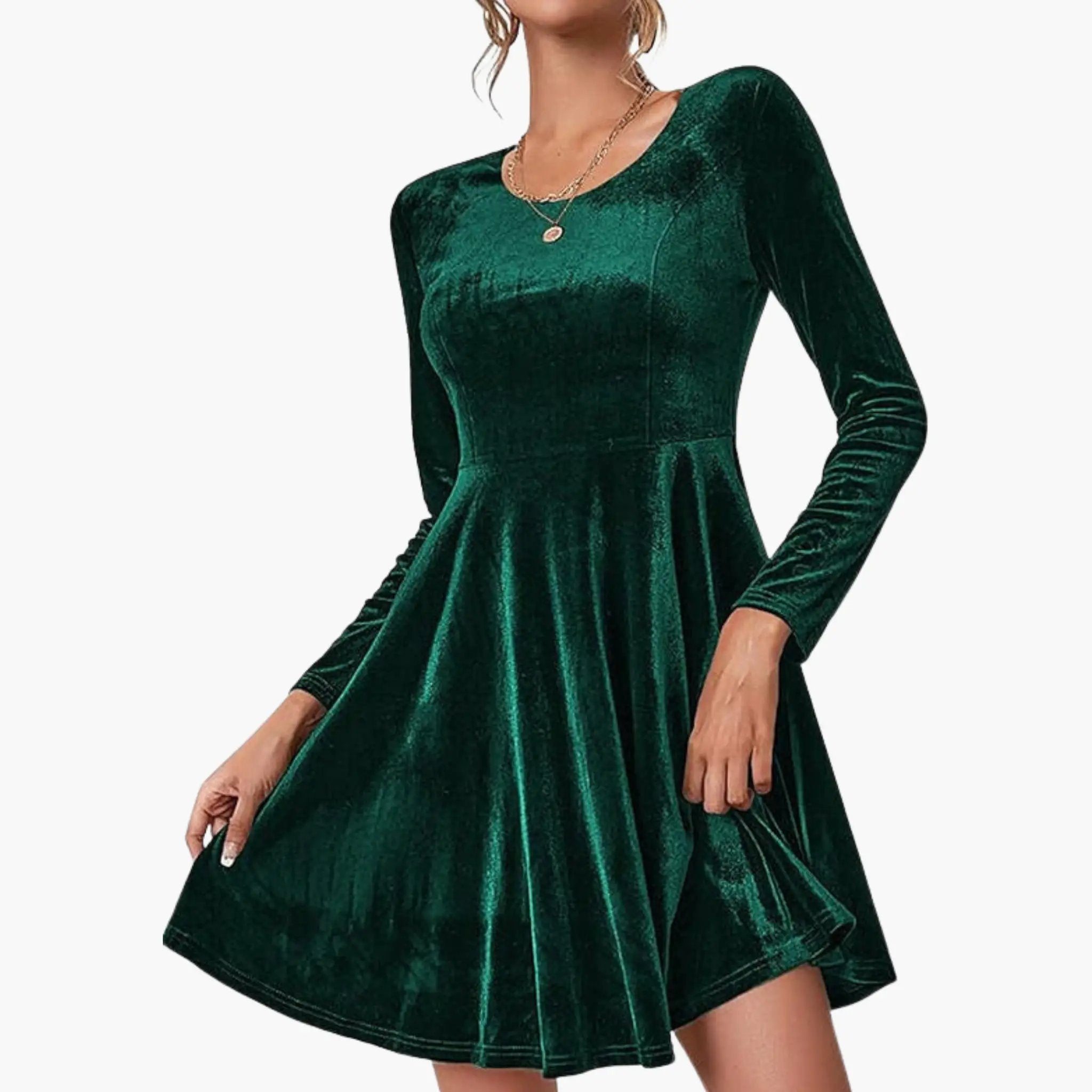Women’s A-Line dress with round neckline in emerald green velvet, long sleeves by Wilfred Smith.