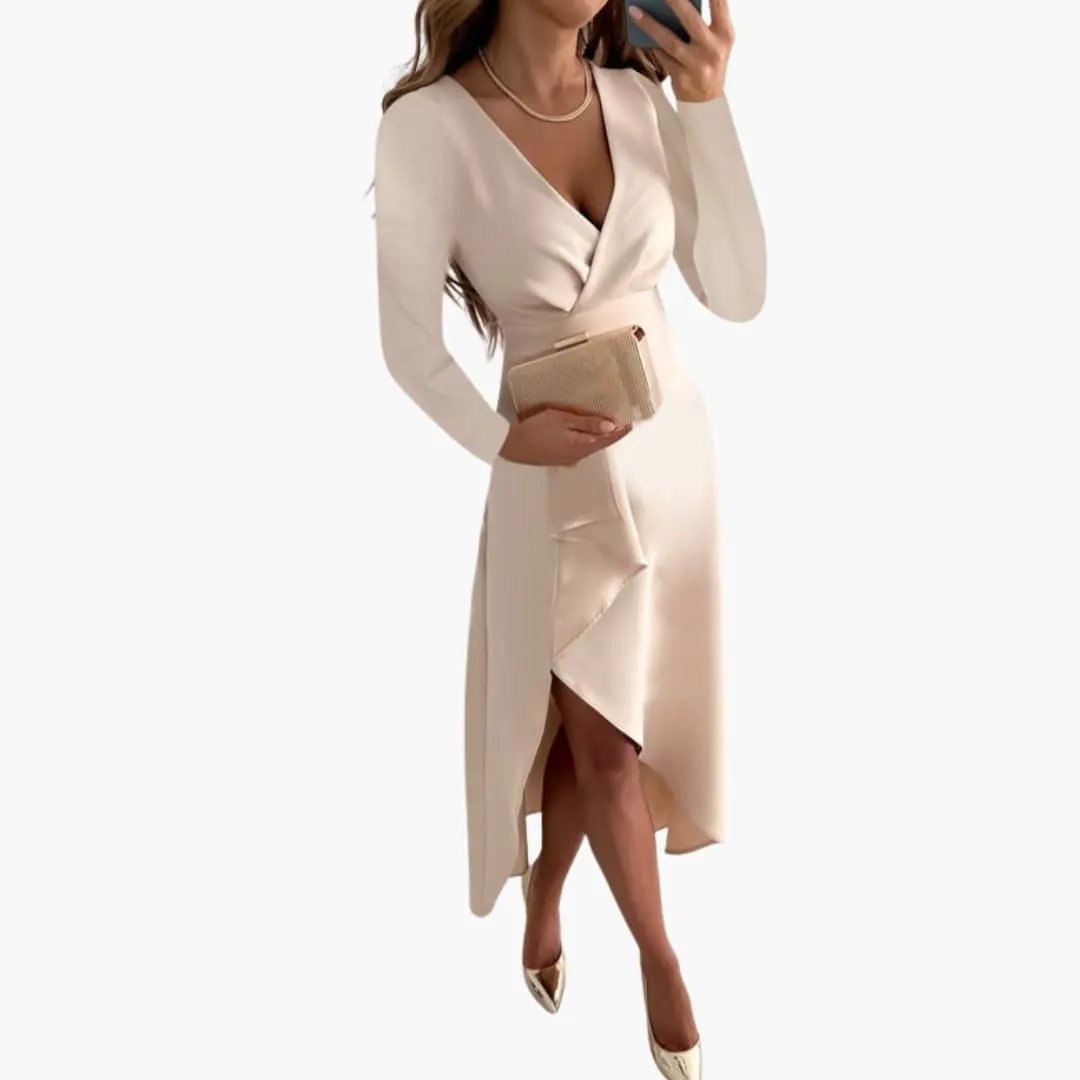 Women’s asymmetrical V-neck knit dress in cream with wrap skirt and long sleeves.