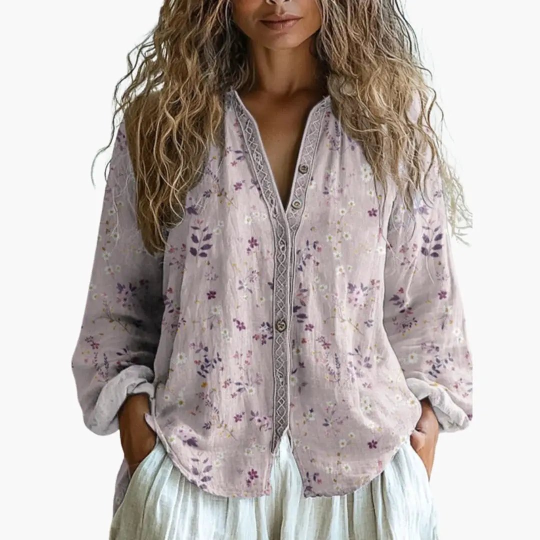 Women's pastel lavender floral blouse with button-down front and long sleeves