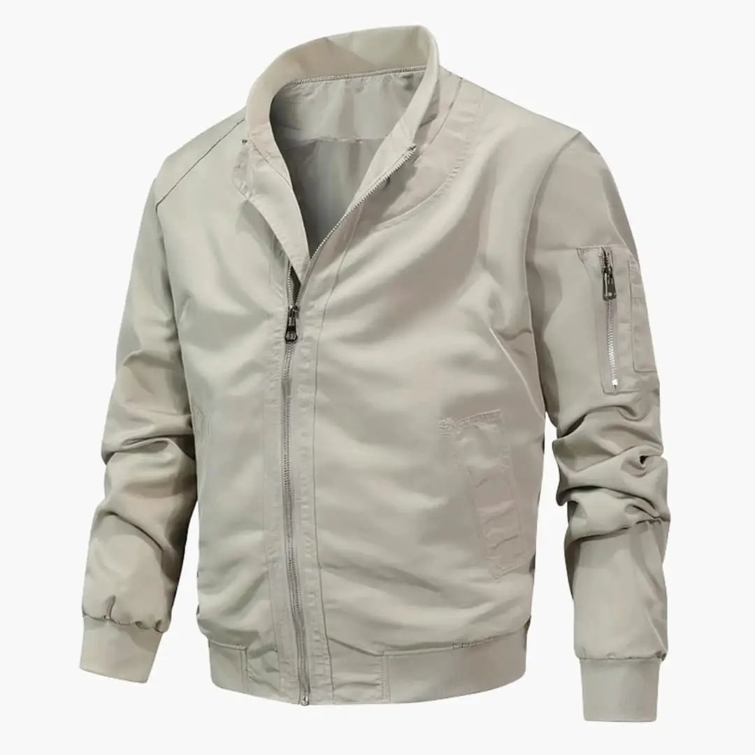 Women's bomber jacket with stand-up collar in beige, front zipper, rib cuffs, and zip arm pocket.