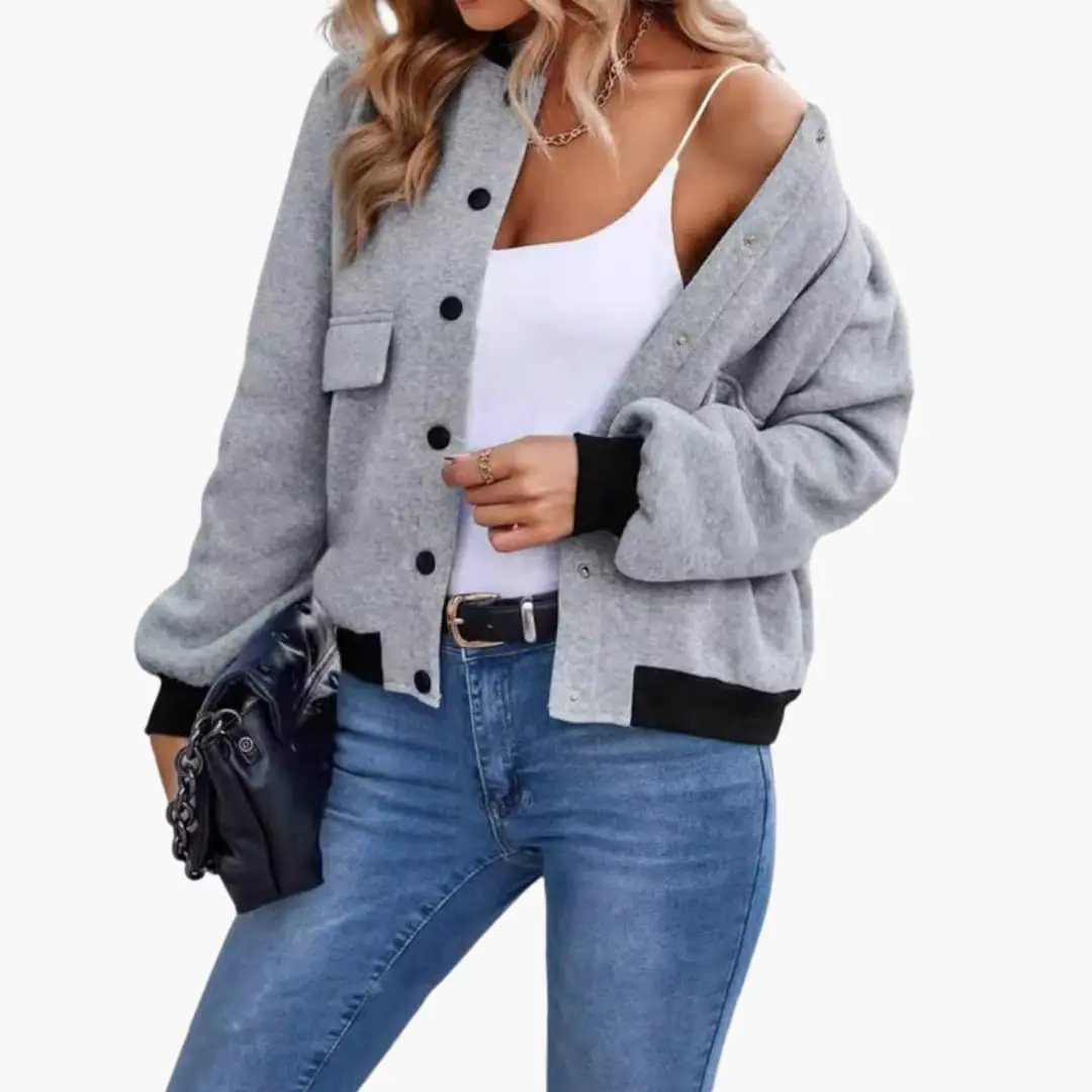 Women’s bomber jacket by Wilfred Smith, gray knit with black cuffs and hem, pockets and contrasting collar.