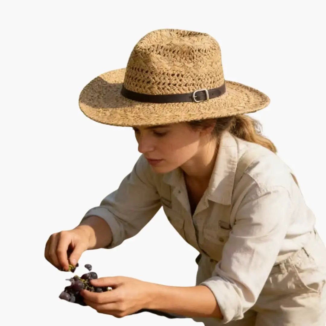 Women's straw cowboy hat with a wide brim and drawstring