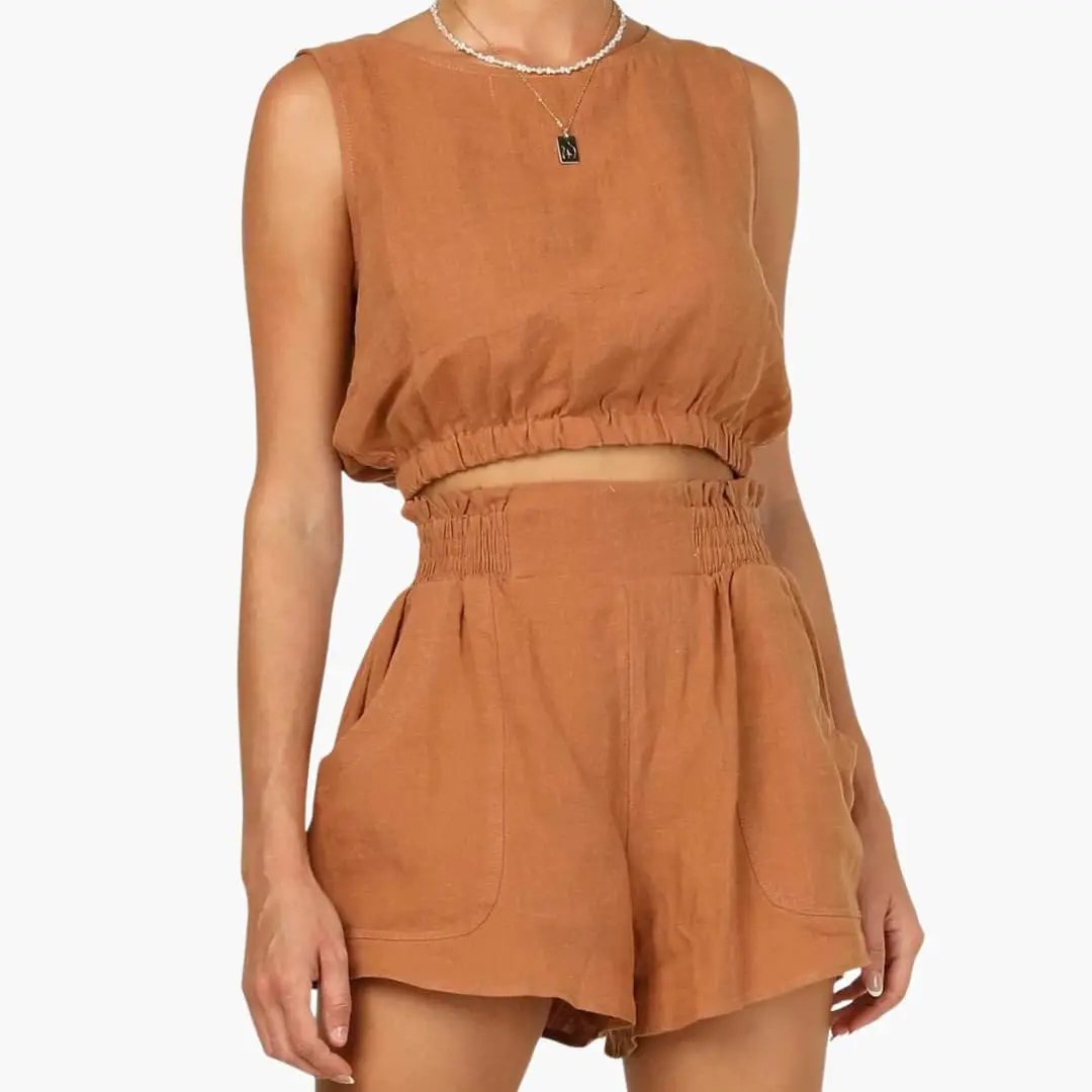 Women's two-piece set in terracotta with a sleeveless drawstring-hem top and high-waisted elastic shorts with pockets