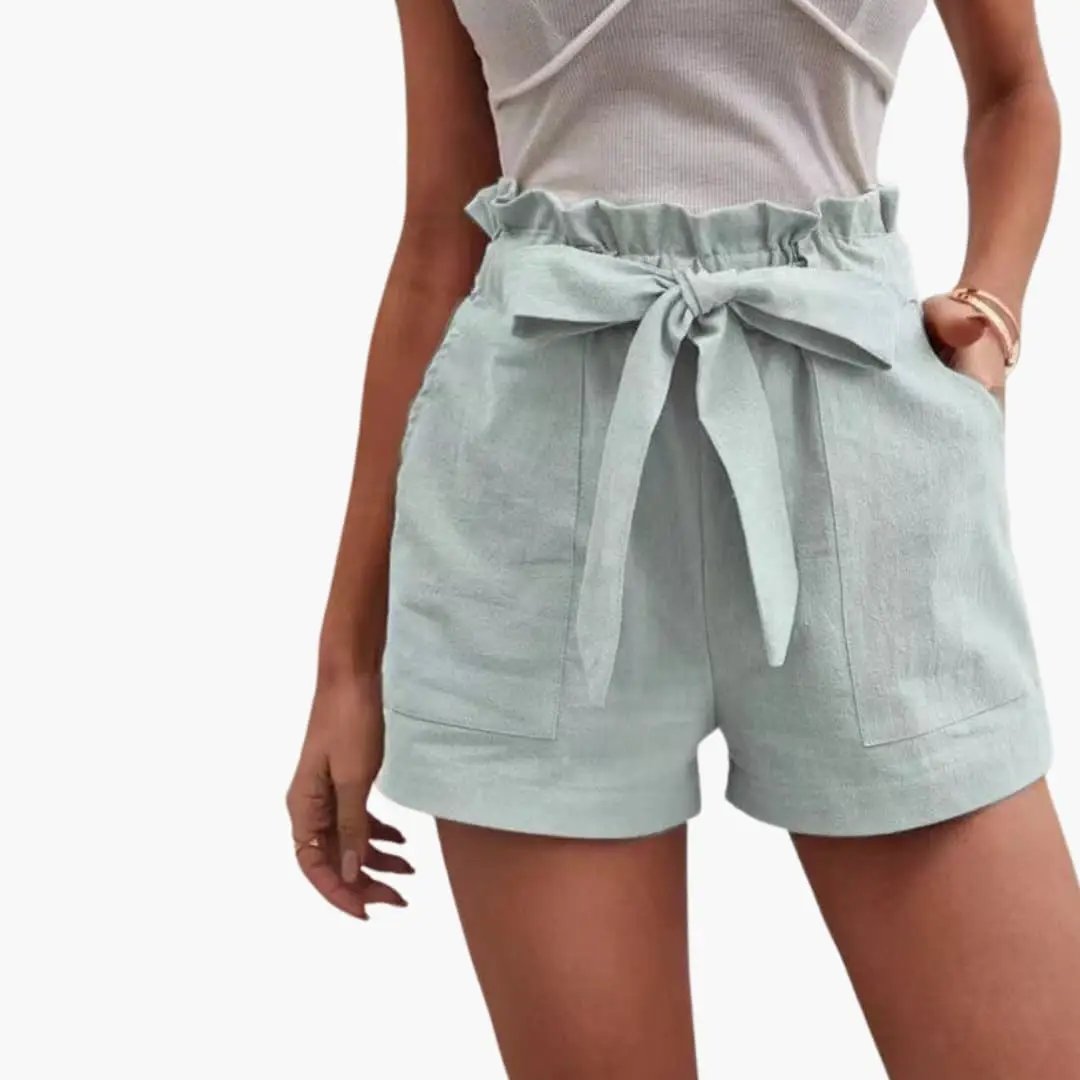 Women's high-waisted shorts with a drawstring belt and pockets in light mint by Wilfred Smith.