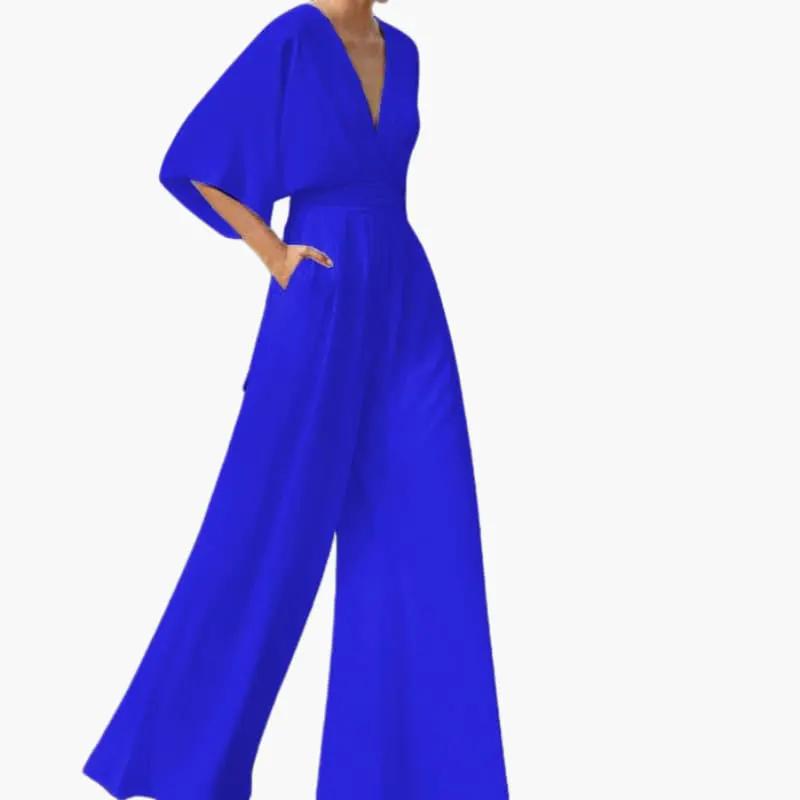 Women's blue summer jumpsuit by Wilfred Smith with V-neck and half sleeves