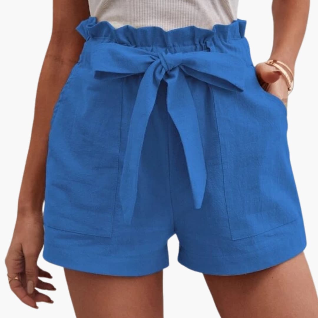 Women’s blue linen shorts with tie belt and wide waistband, front pockets, Wilfred Smith.