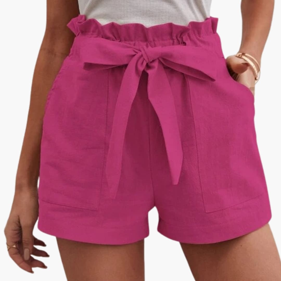 Women's linen shorts in pink with a tie belt and wide waistband