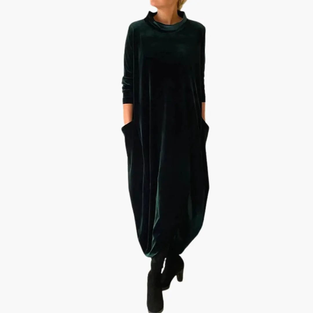Women's long-sleeve velvet evening dress in dark green by Wilfred Smith