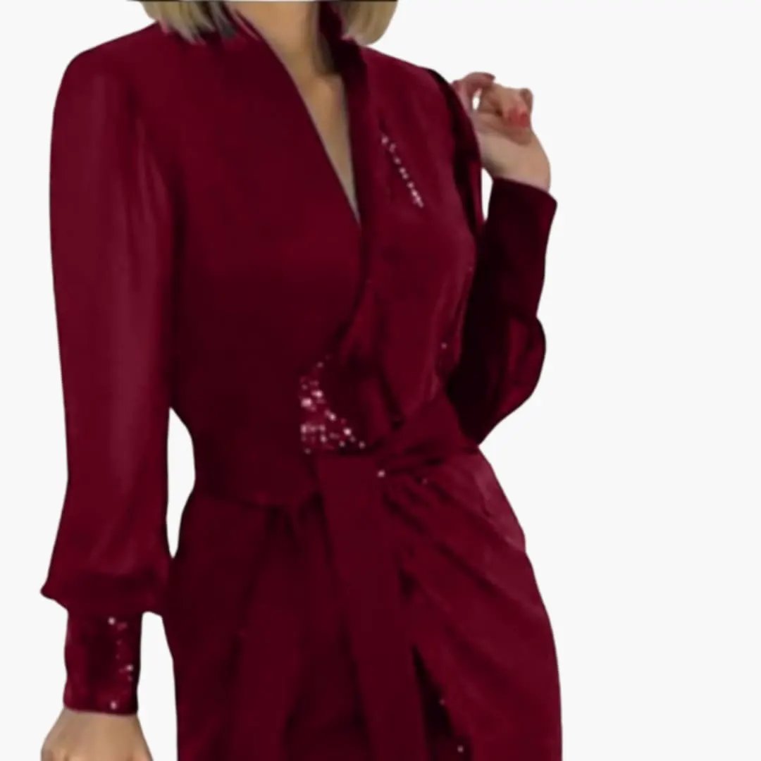 Women’s long sleeve sequin dress with a fitted waist in burgundy, wrap silhouette.