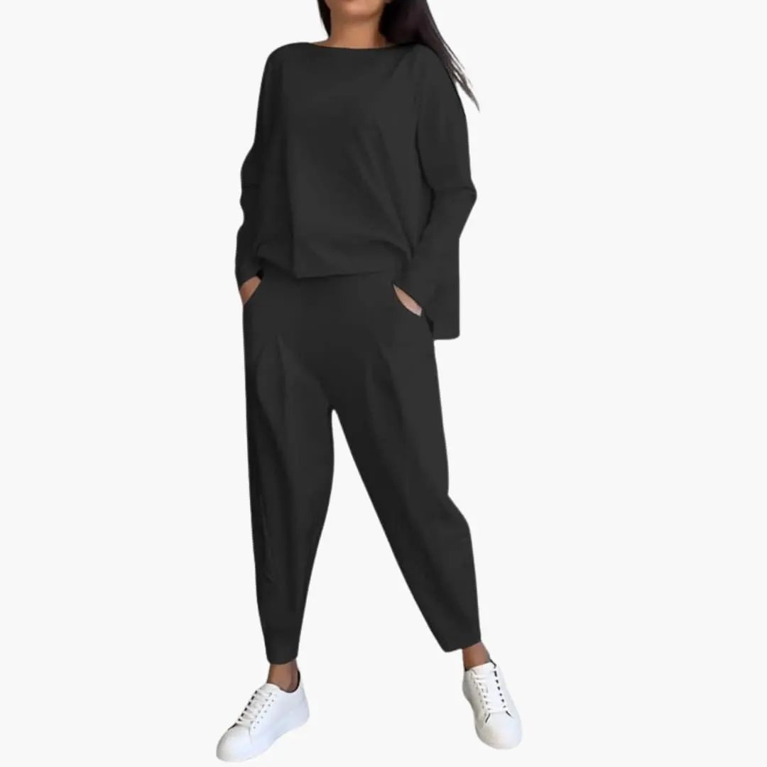 Women’s Long Sleeve Two-Piece Outfit Set in black with round-neck top and full-length pants by Wilfred Smith.