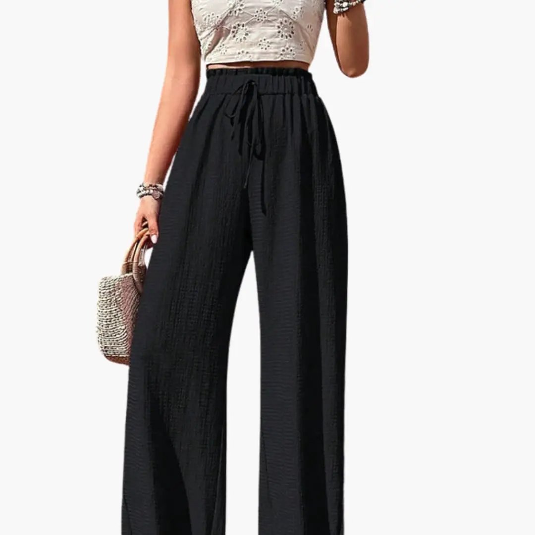 Women’s wide-leg black trousers with elastic waistband and drawstring by Wilfred Smith