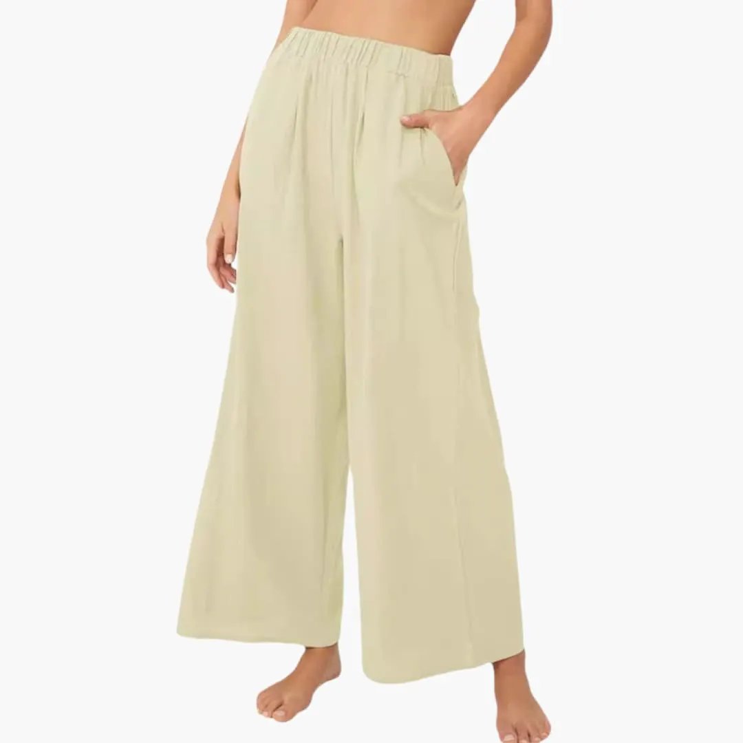 Women’s loose beige wide-leg summer pants with elastic waist and side pockets