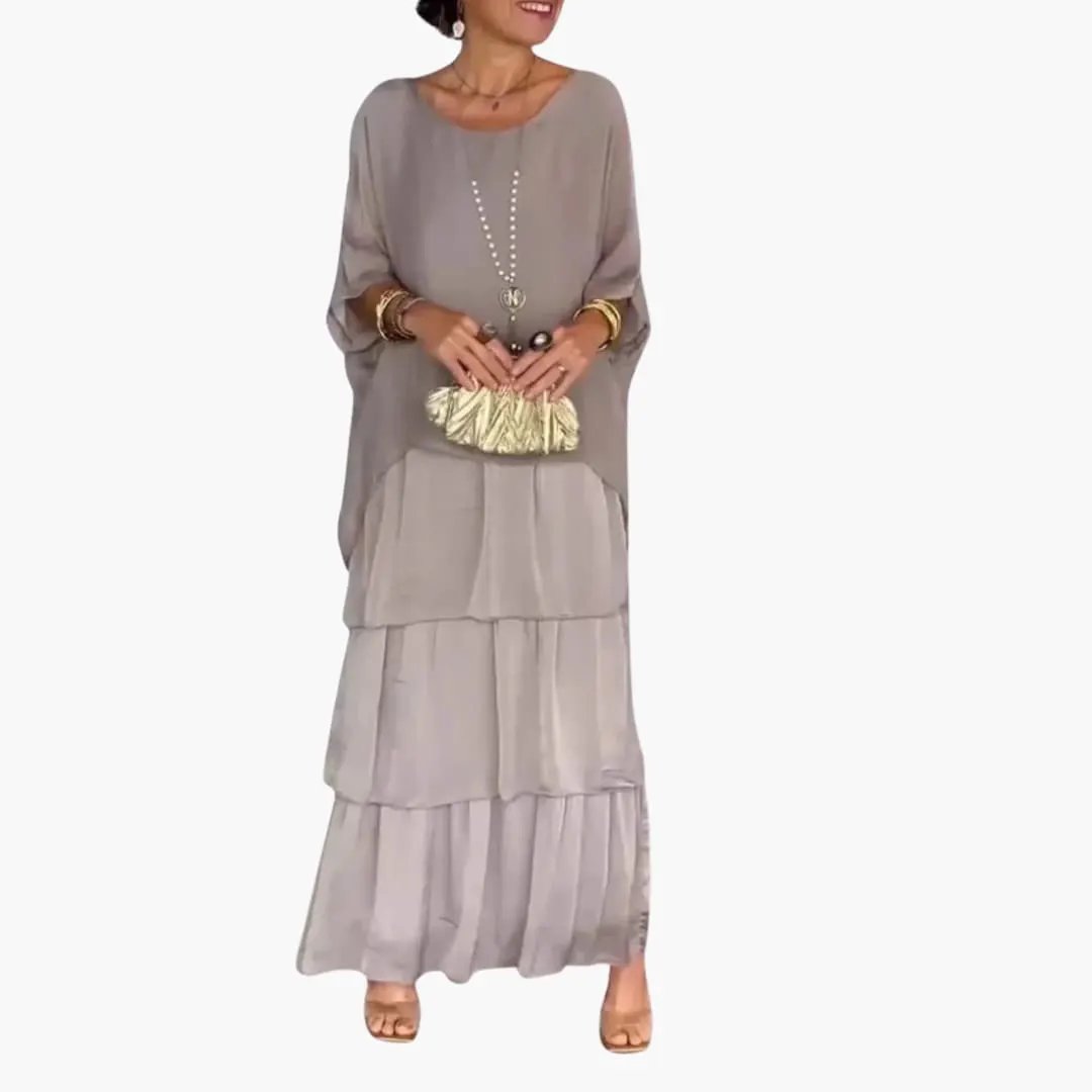 Women's Maxi Dress by Wilfred Smith in taupe with round neck, smocked sleeves, and tiered skirt.