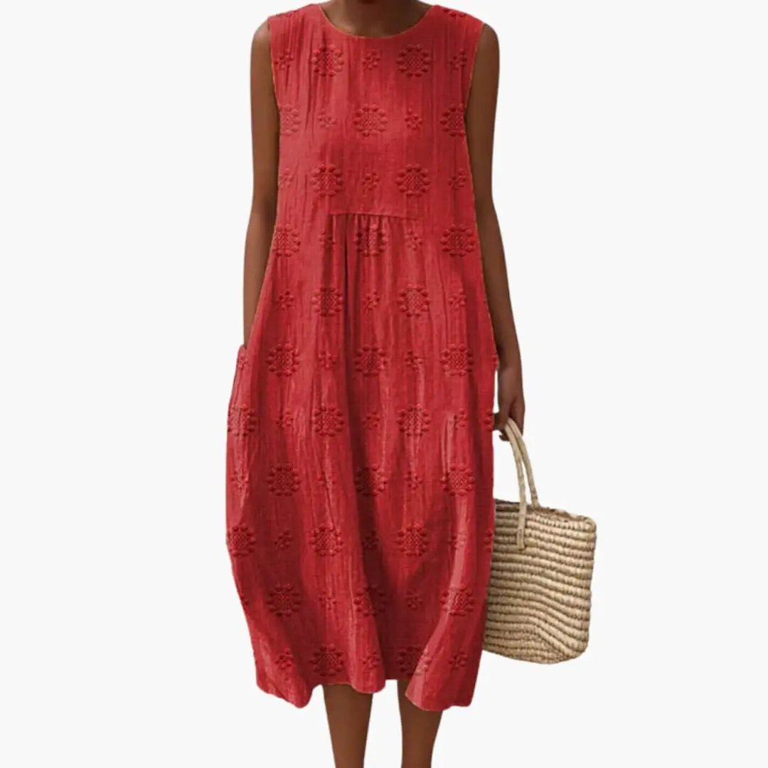 Women's sleeveless maxi dress in red with eyelet floral pattern and side pockets