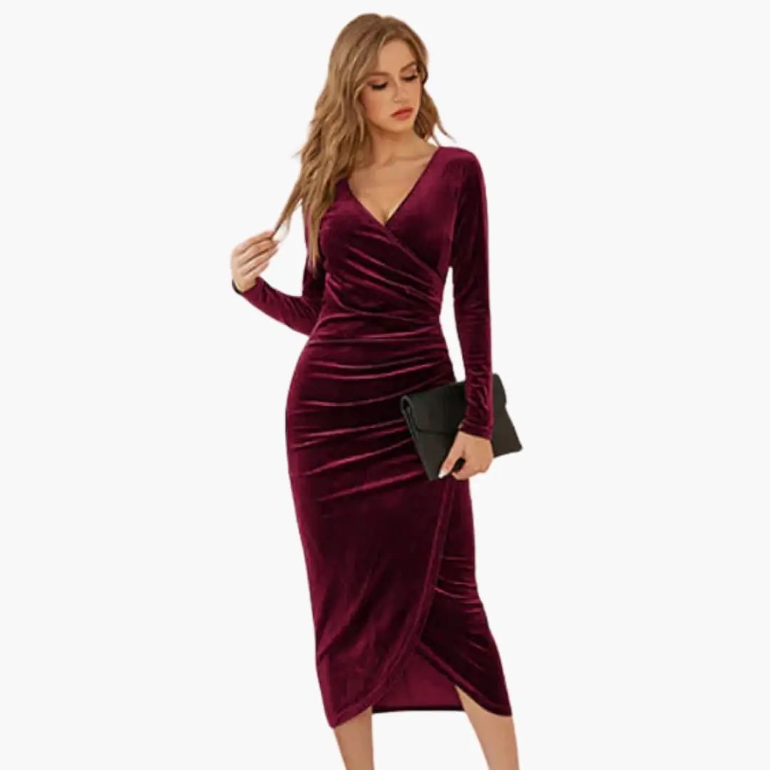 Women’s velvet burgundy midi dress by Wilfred Smith with long sleeves and a draped wrap skirt.