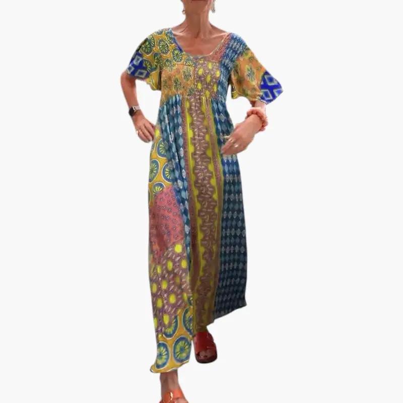 Women's midi dress with V-neck and short sleeves in a vibrant multi-color patchwork print.