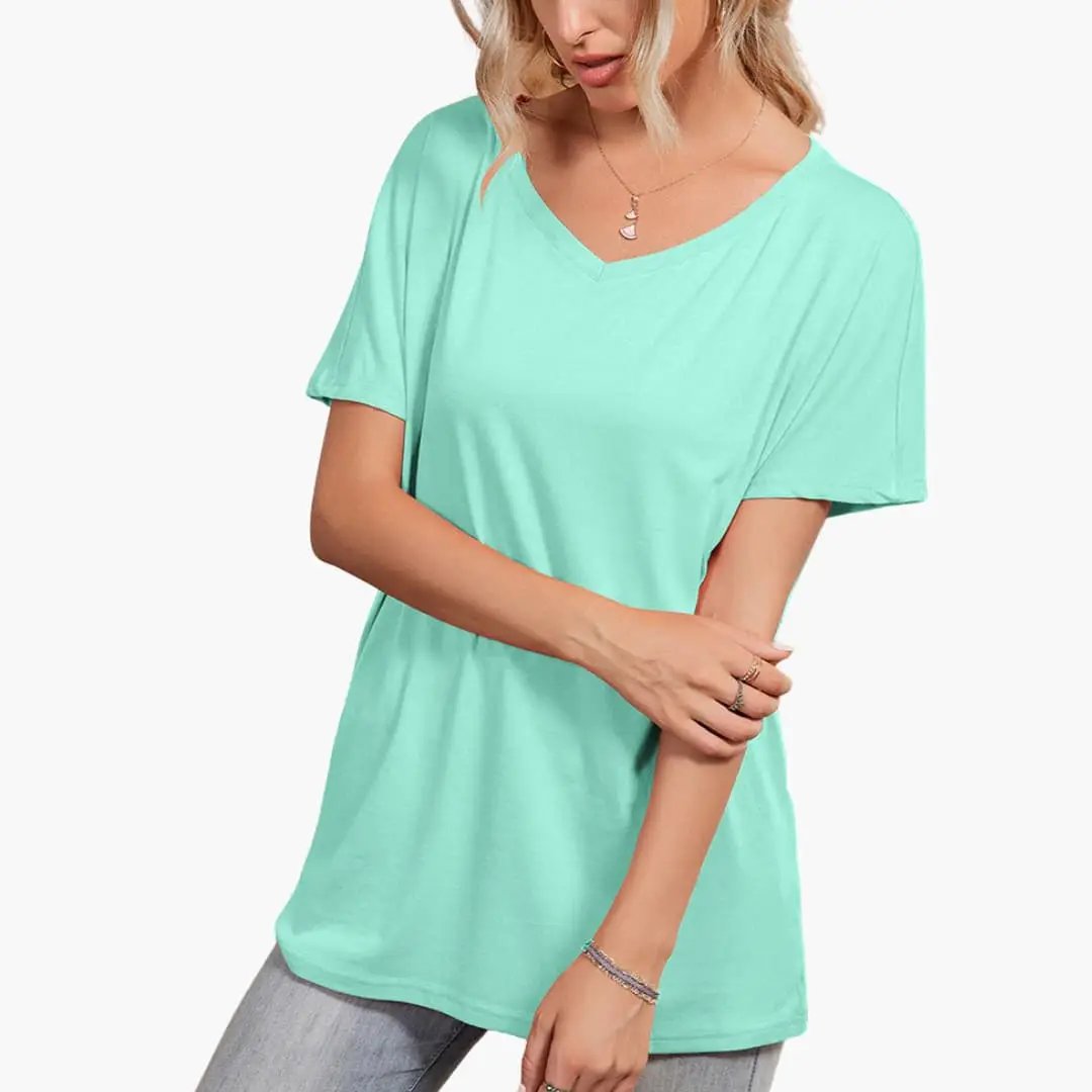 Women's oversized crew neck short sleeve t-shirt with asymmetrical hem in mint green
