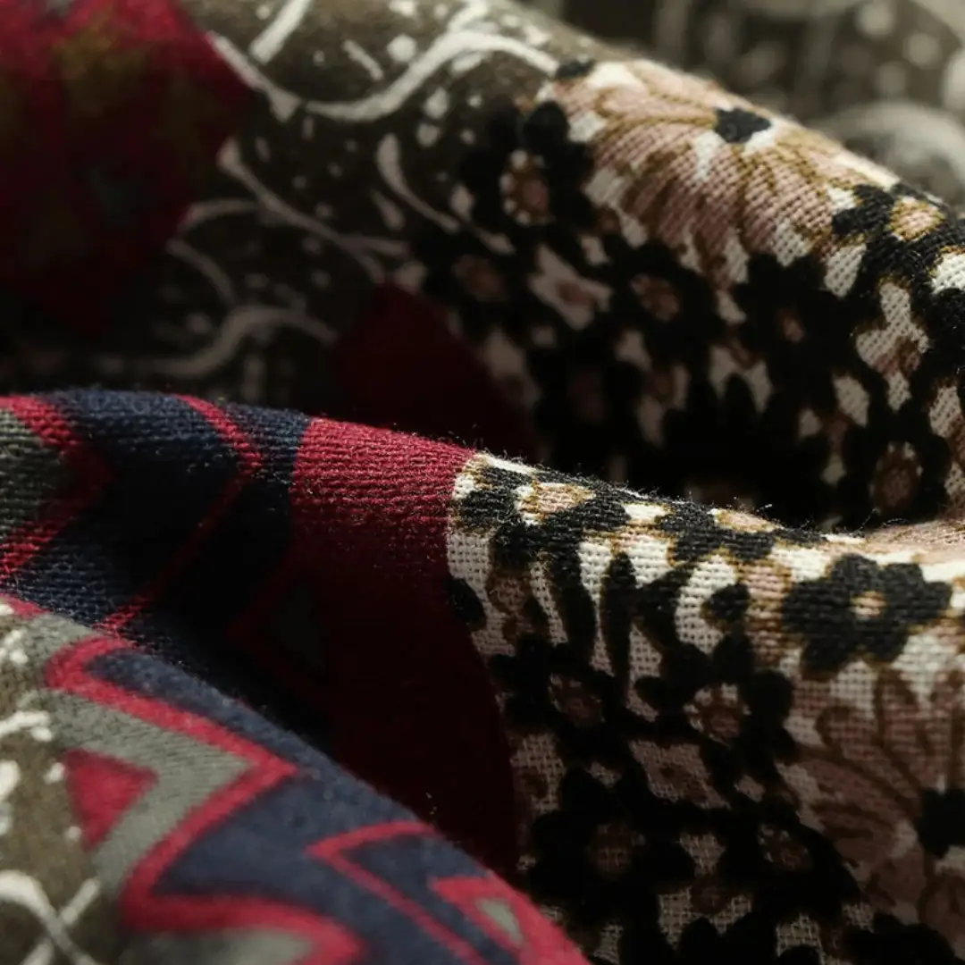 Women’s Patchwork Overcoat by Wilfred Smith with soft lining and hood in a mixed-pattern woven fabric