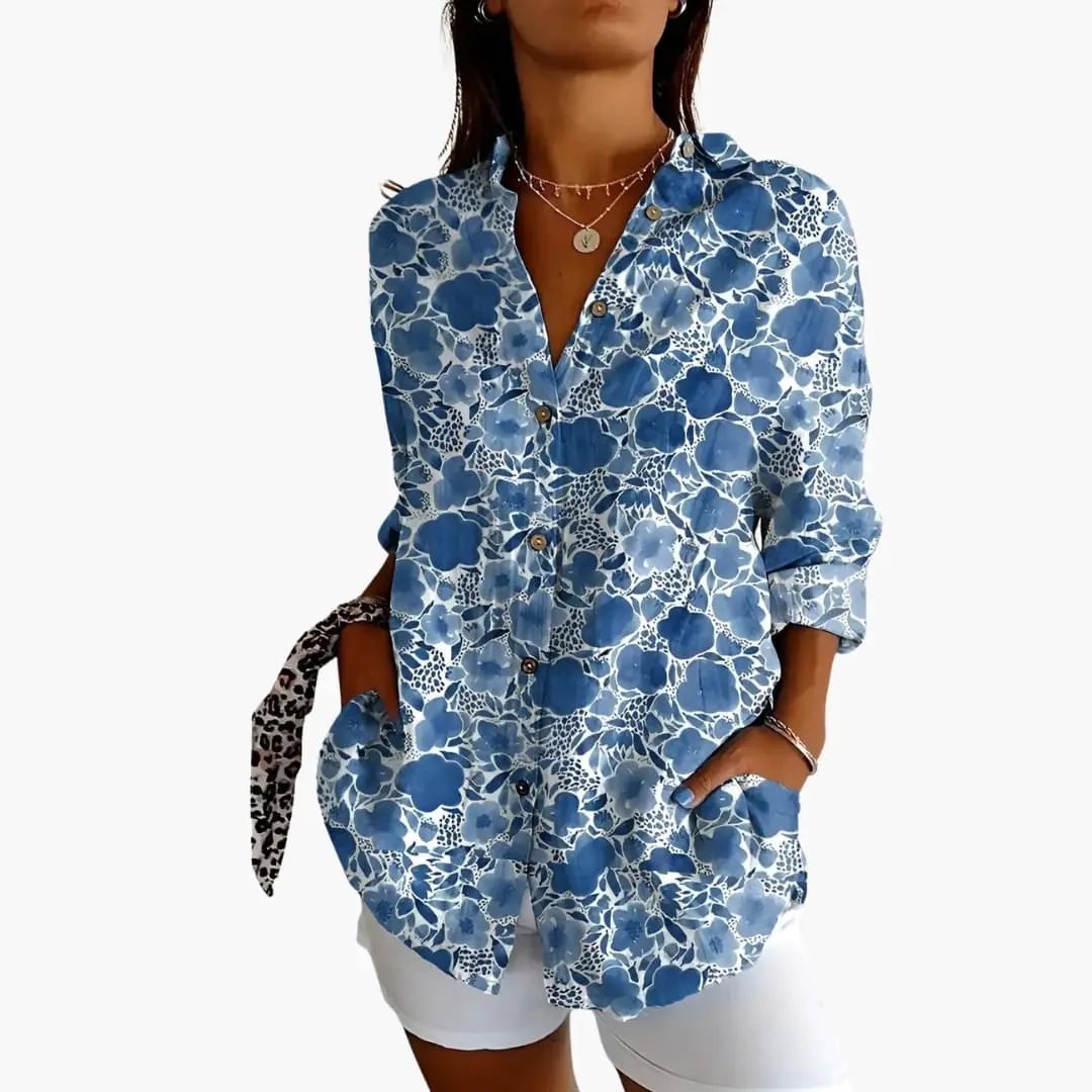 Women’s blue floral printed blouse with button-front, rolled sleeves, loose fit by Wilfred Smith