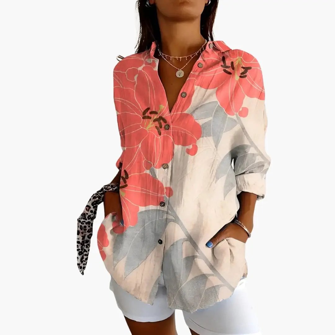 Women’s printed blouse with coral pink floral pattern on beige, loose-fit short-sleeve top