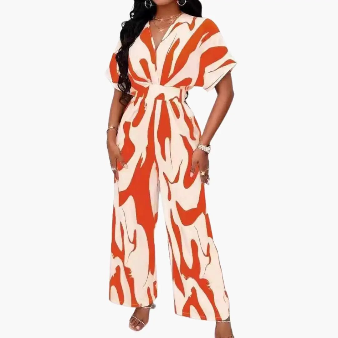 Wilfred Smith women’s printed wide-leg jumpsuit with V-neck and waist belt in orange and cream abstract pattern