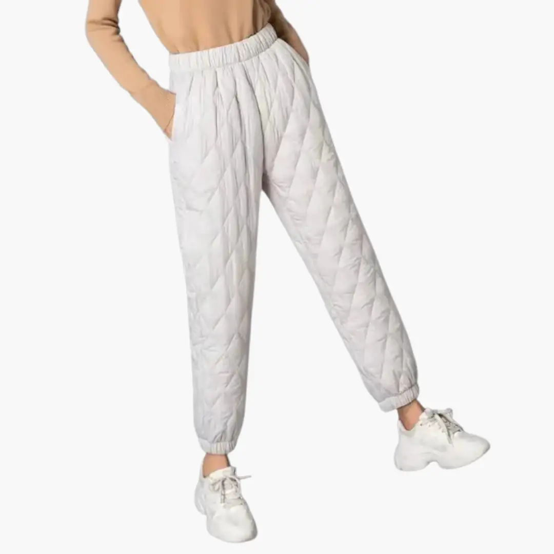 Women's Quilted Jogger Trousers by Wilfred Smith, elastic waist and cuffed hems in light gray.