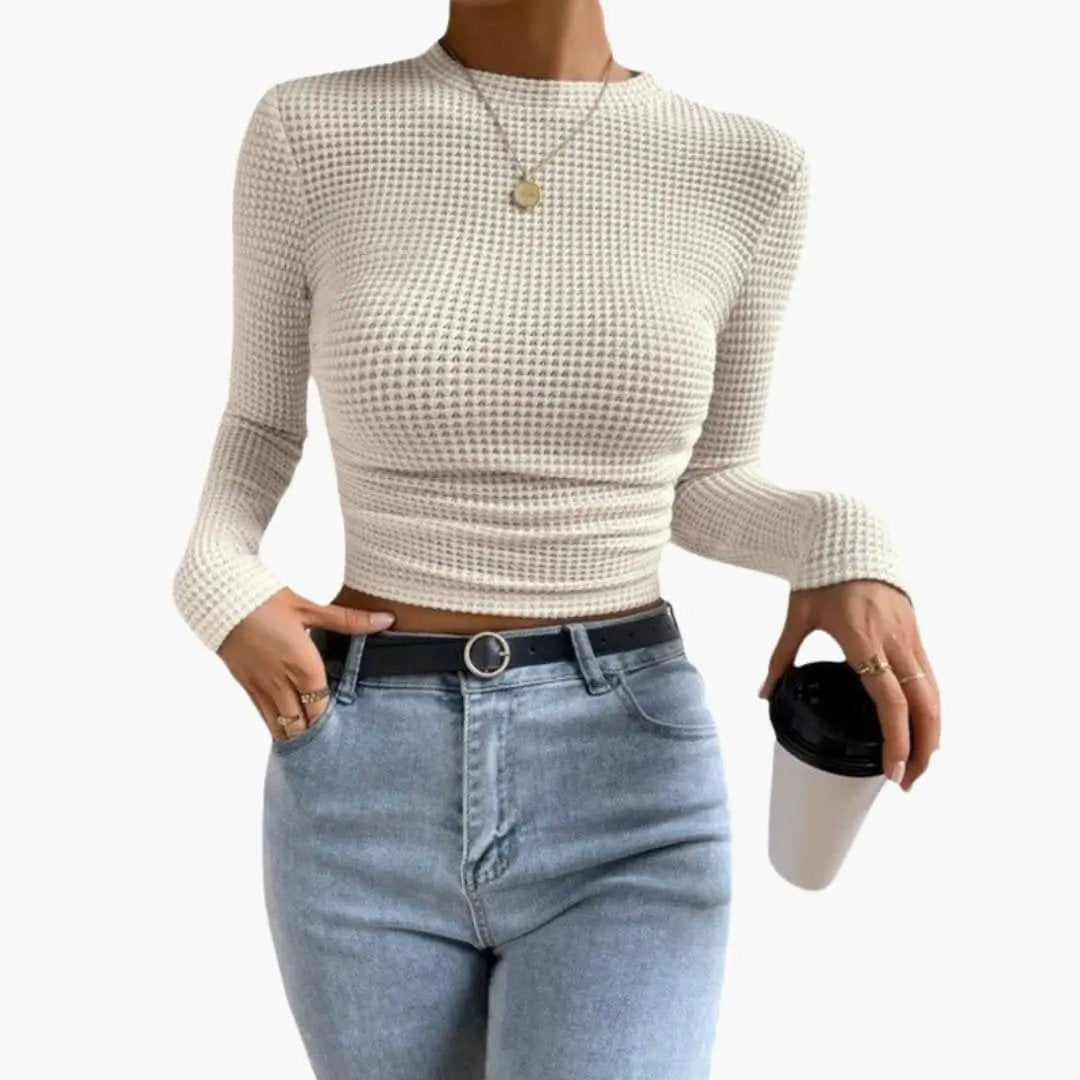 Women's ribbed long sleeve crop top by Wilfred Smith in cream.