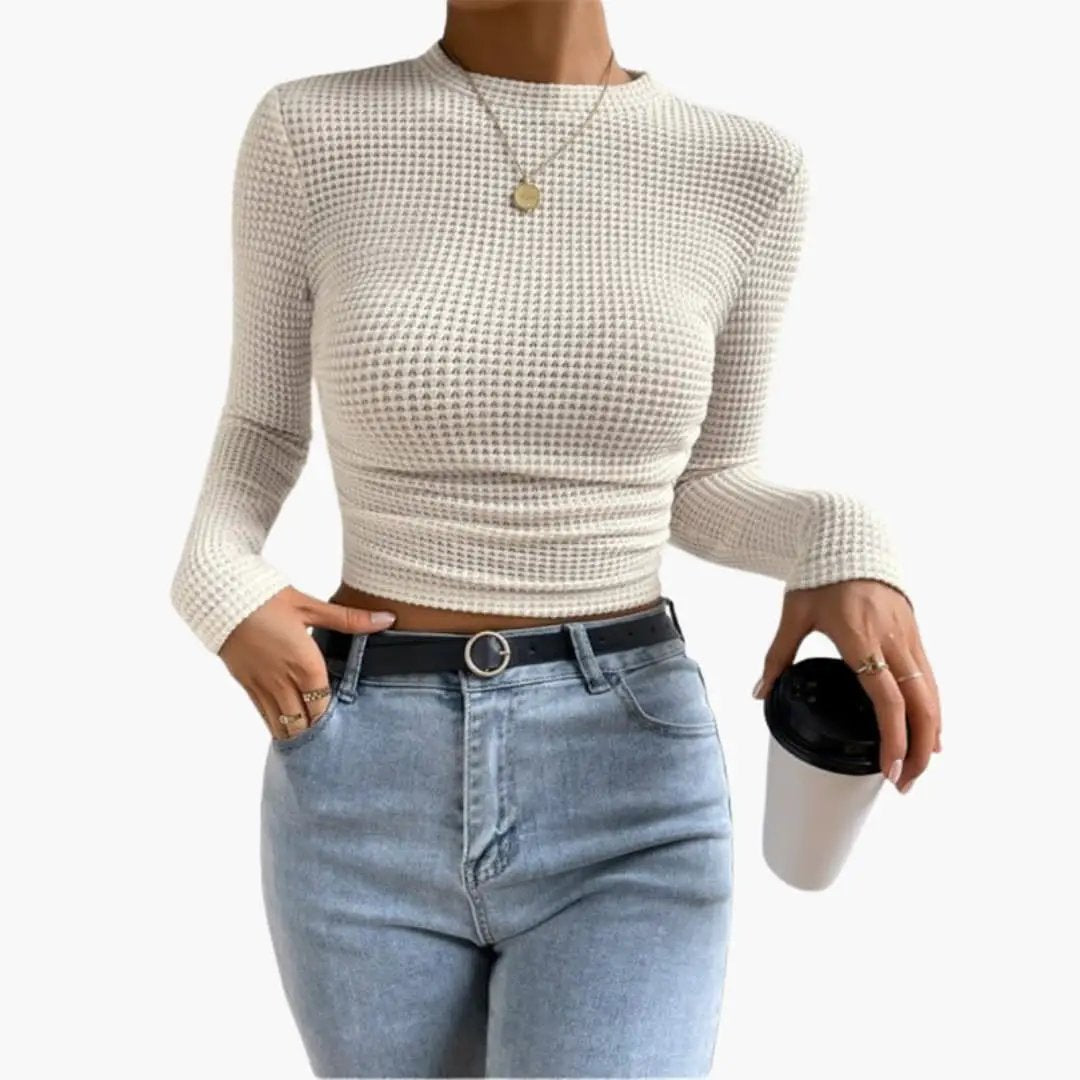 Women's ribbed long-sleeve crop top in cream knit, cropped fit with light-wash jeans