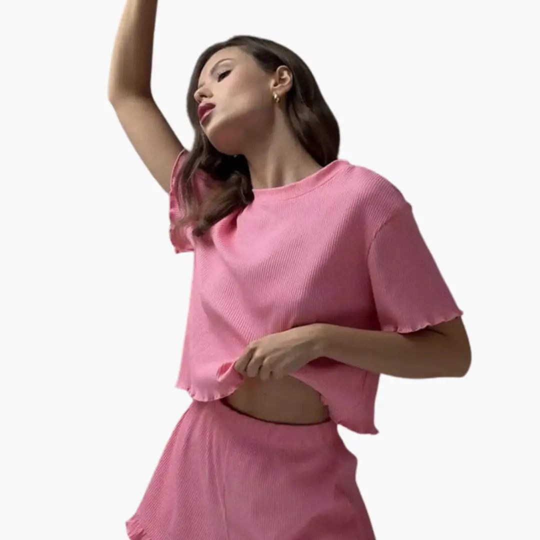 Women's ribbed two-piece set with pink ruffle-sleeve top and matching shorts by Wilfred Smith
