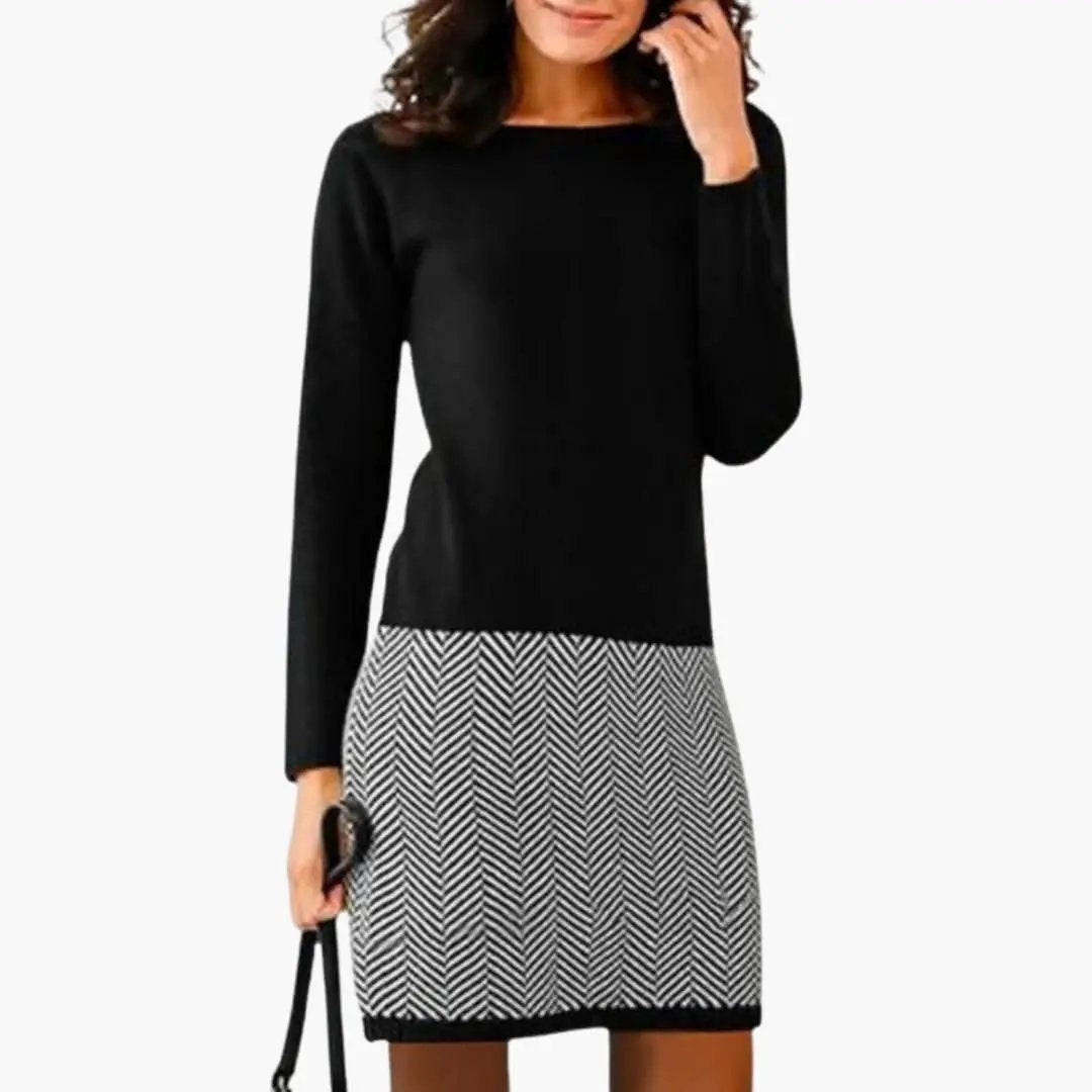 Women’s round-neck dress in black with a black-and-white houndstooth hem by Wilfred Smith