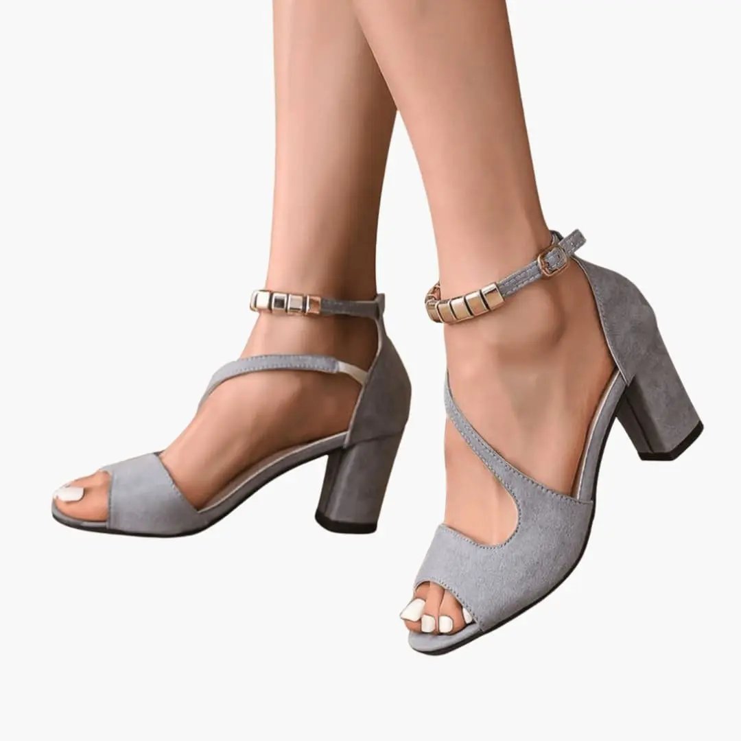 Women's sandals by Wilfred Smith with block heel, adjustable ankle strap, open toe in grey suede.