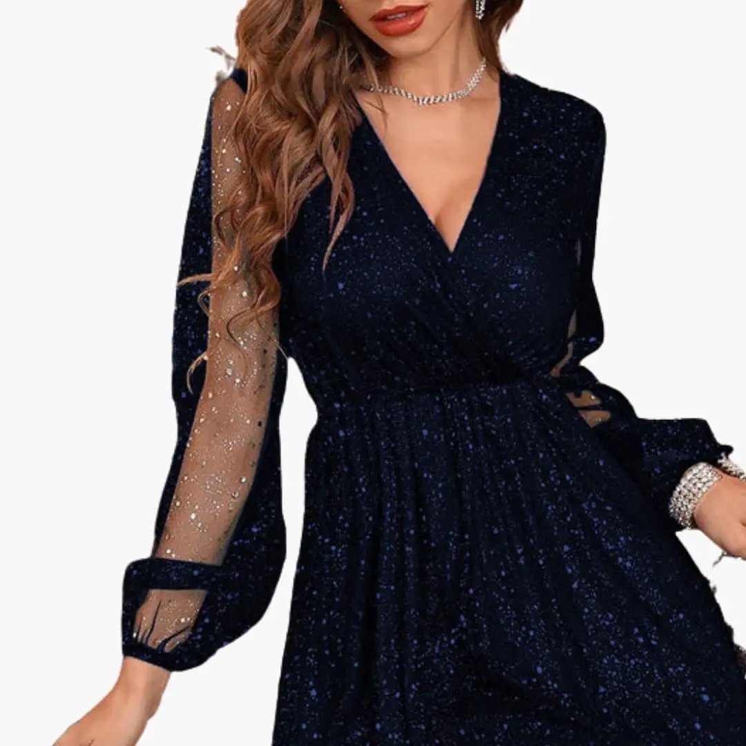 Women's short sequin dress with V-neckline in navy and sheer long sleeves.