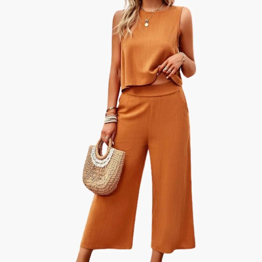 Wilfred Smith Women’s Jumpsuit in burnt orange, short-sleeve button-front, wide-leg.