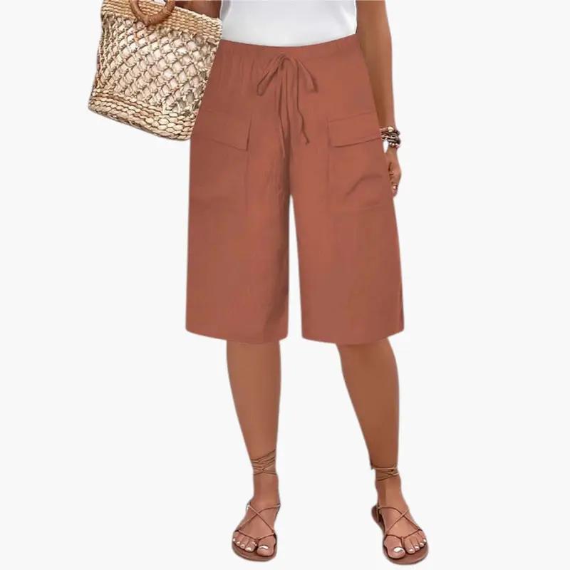 Women's Bermuda shorts with drawstring waist and front pockets in rust brown.
