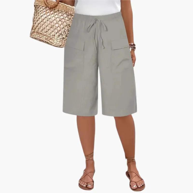 Women's Bermuda shorts by Wilfred Smith with drawstring waist and front pockets, light gray.