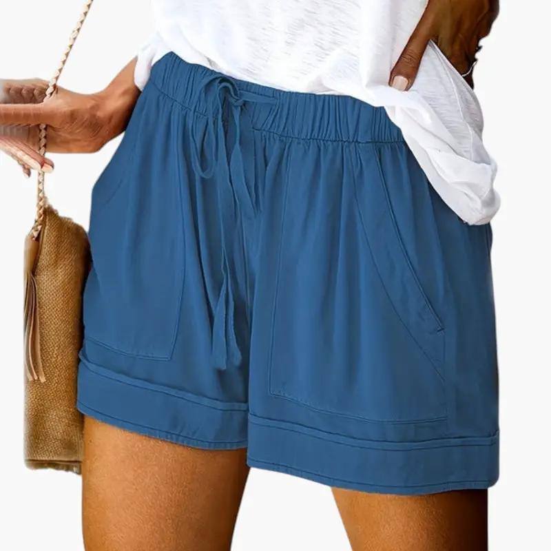Women's blue jogger shorts with drawstring waistband, relaxed fit, front pockets