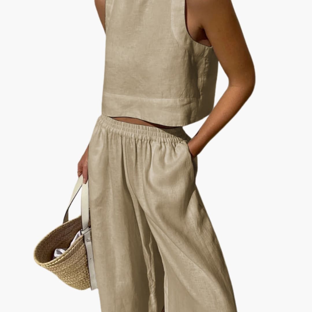Women’s sleeveless crop top and wide-leg pants two-piece set in beige by Wilfred Smith.