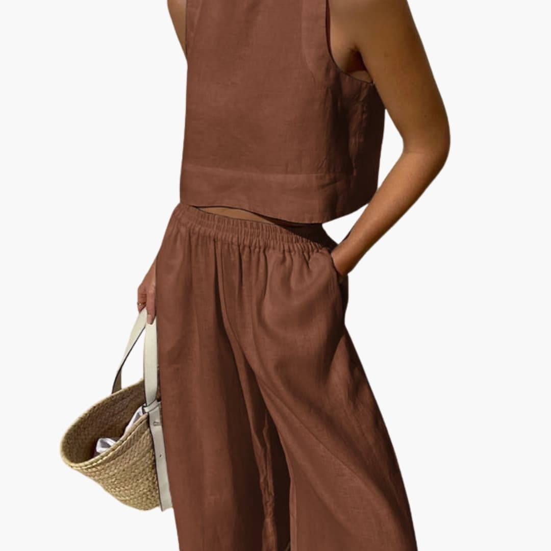 Women’s sleeveless crop top and wide-leg pants two-piece outfit by Wilfred Smith in brown fabric