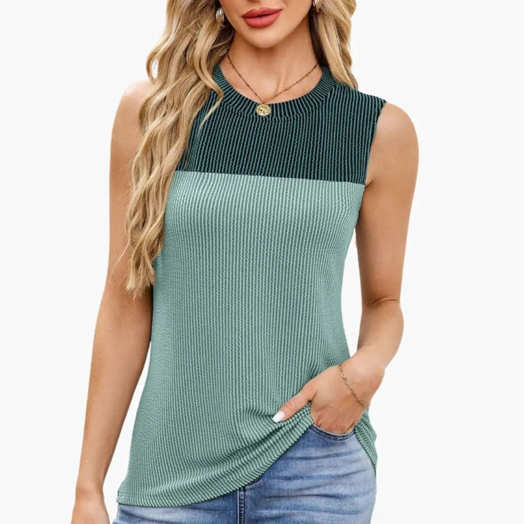 Women's sleeveless ribbed top by Wilfred Smith, teal and mint color-block with side pockets