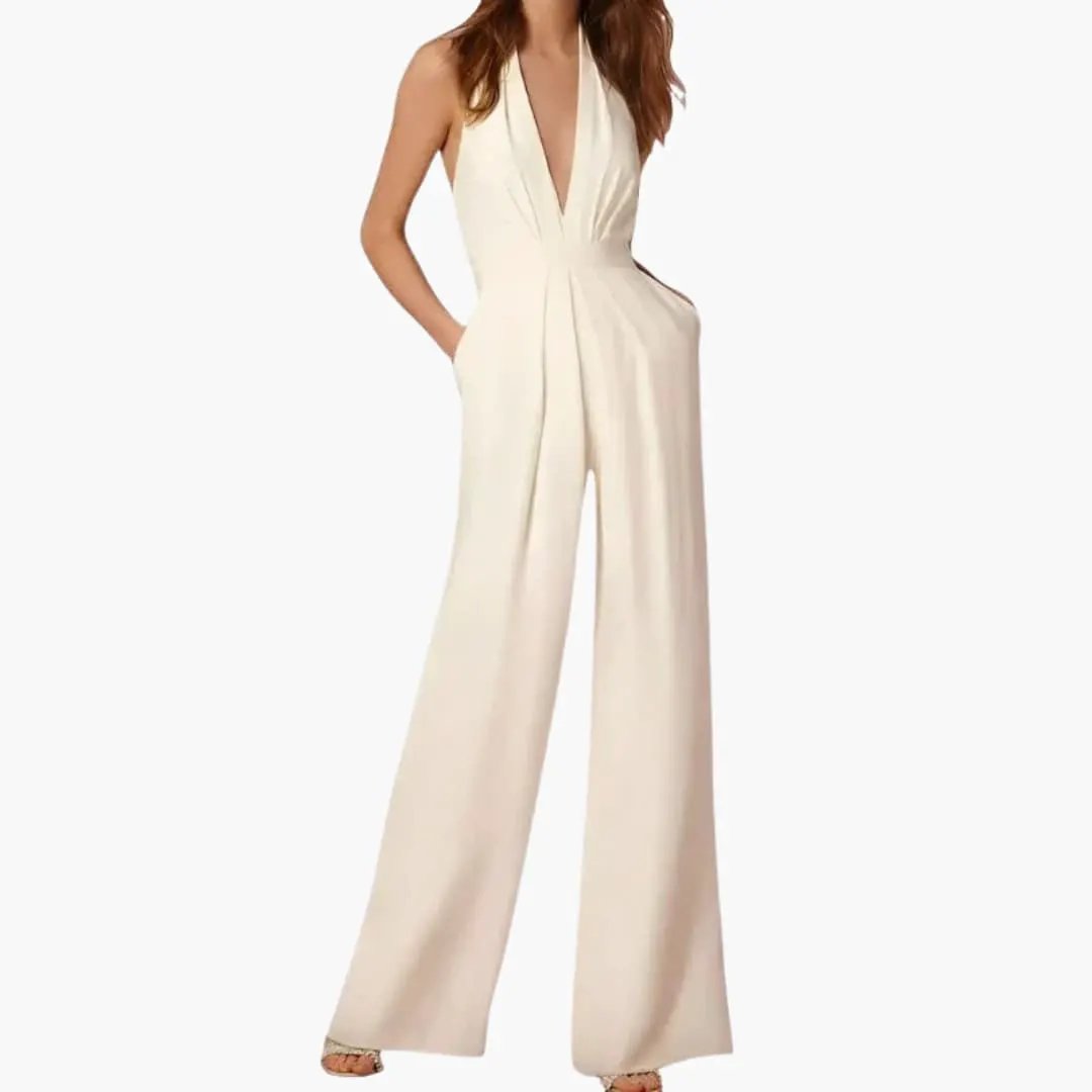 Women's sleeveless jumpsuit in ivory, wide-leg one-piece by Wilfred Smith with halter neck and pockets.