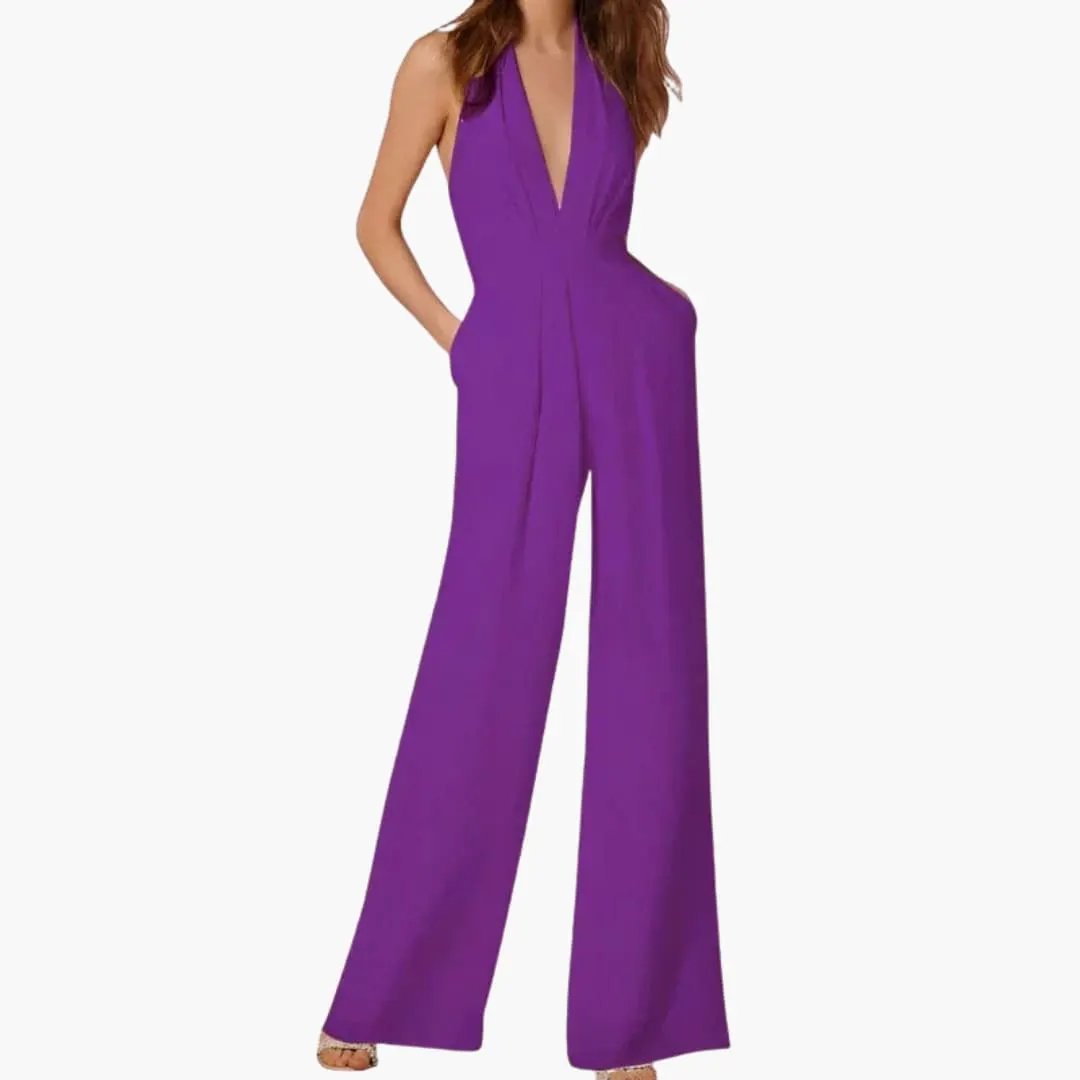 Women's sleeveless jumpsuit in purple with a wide-leg silhouette by Wilfred Smith, one-piece design.
