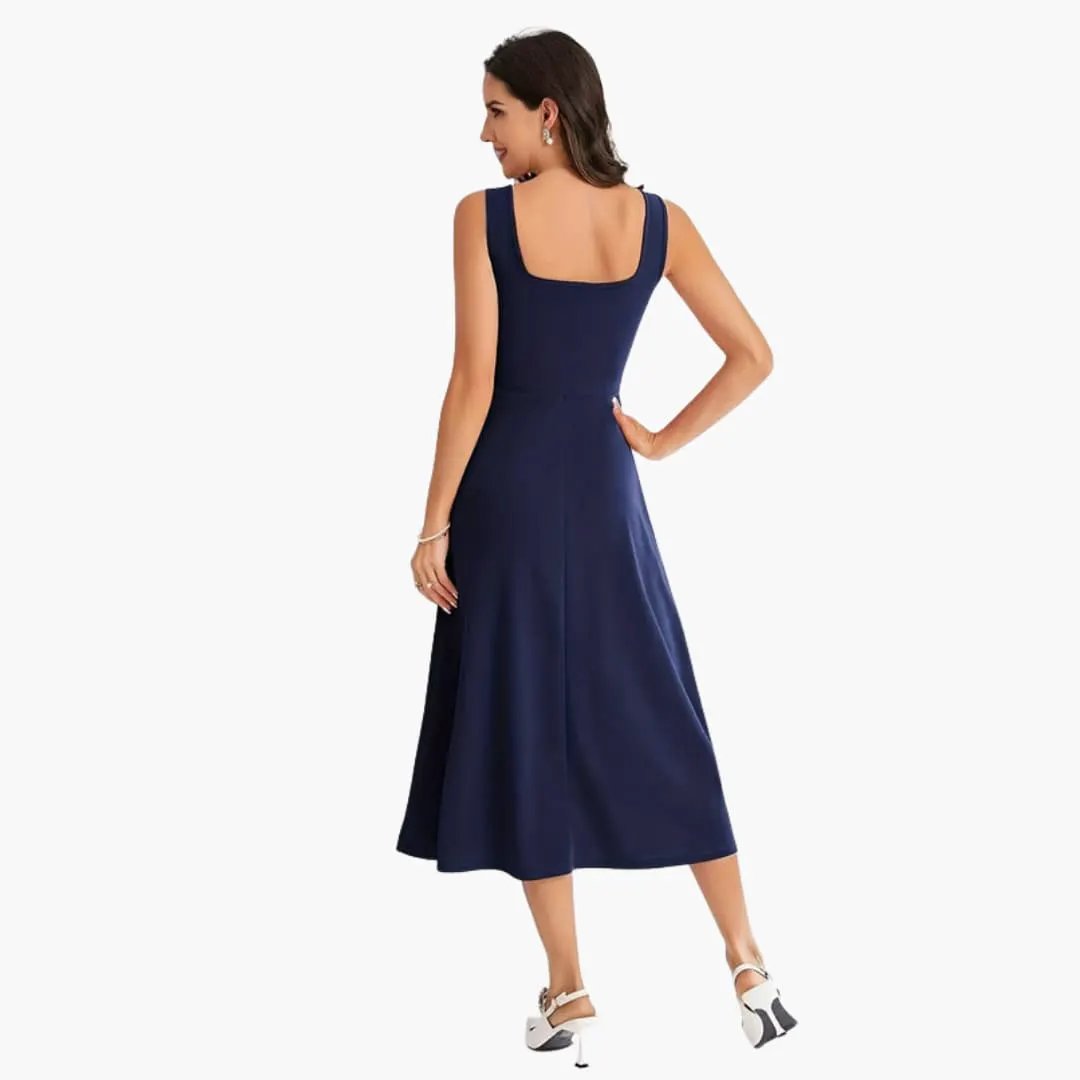 Women’s sleeveless strap dress by Wilfred Smith in navy with fitted bodice and straight hem