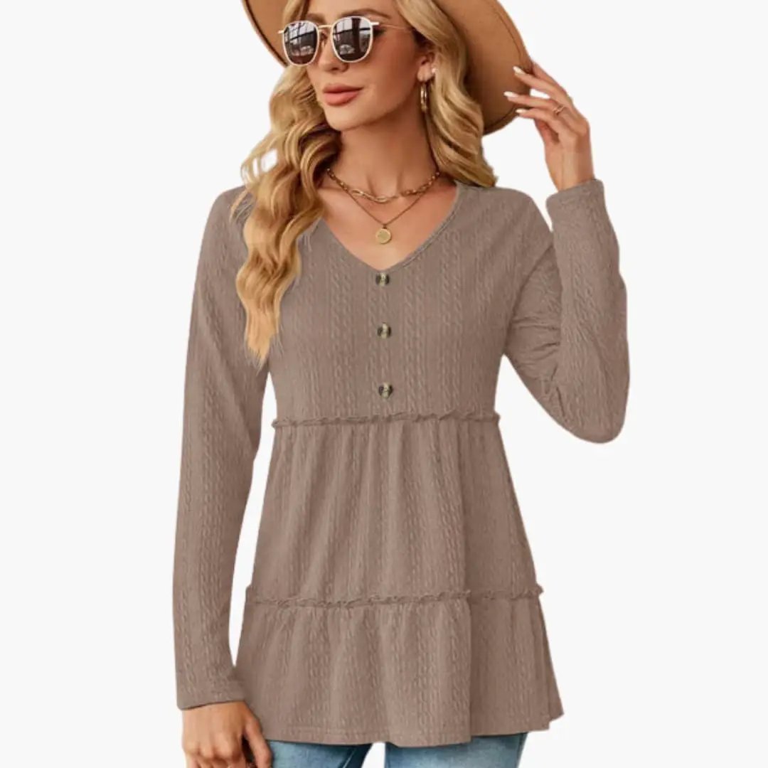 Women's tunic top by Wilfred Smith in taupe knit with V-neck, button accents, and flowing hem.