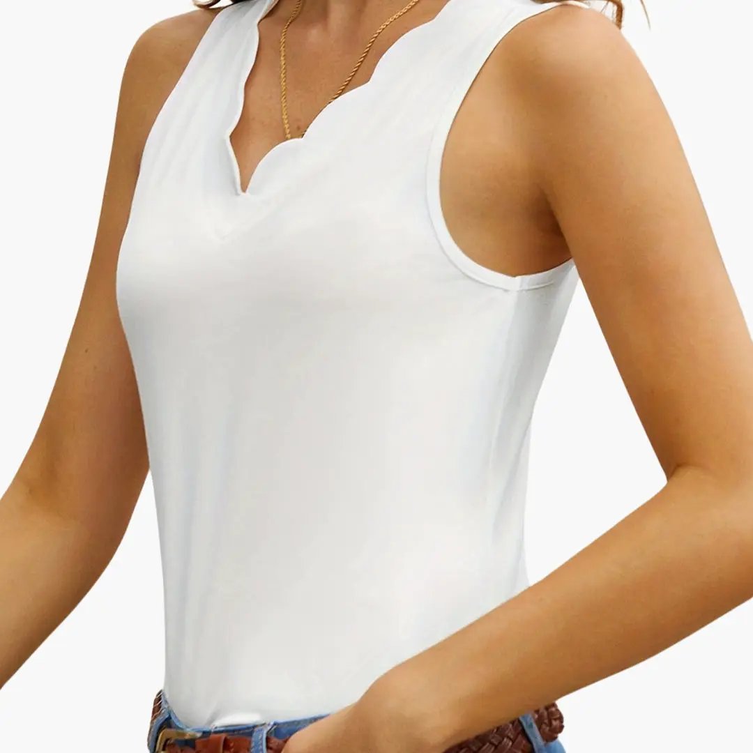 Women's sleeveless V-neck tank top in white with a wavy hem by Wilfred Smith