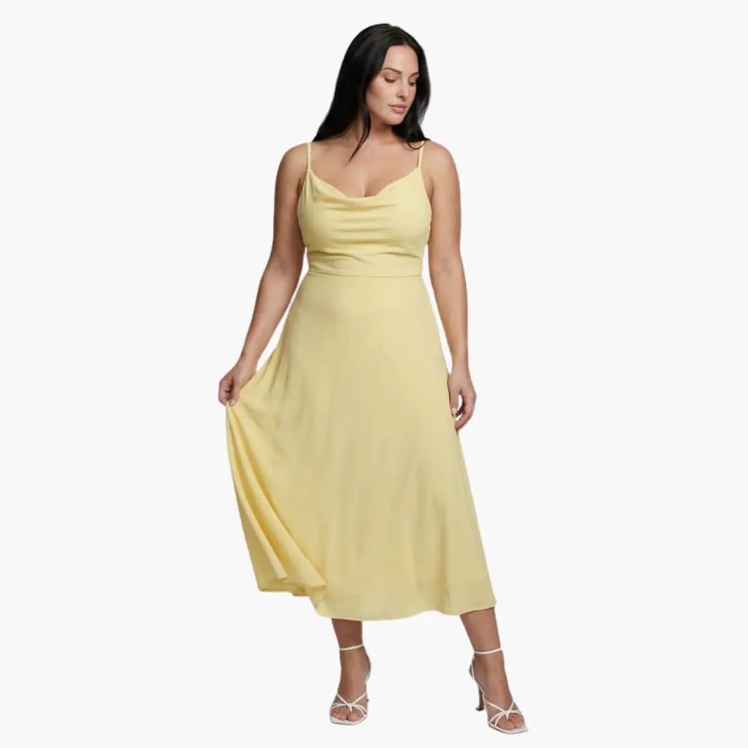Women’s square-neck yellow maxi dress with thin straps, flowing A-line skirt, ideal for warm weather.