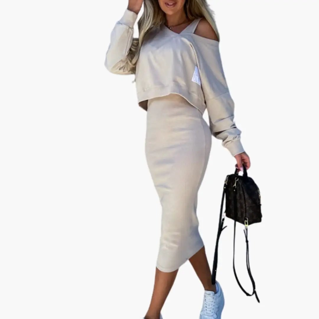 Women’s Sweatshirt Dress by Wilfred Smith in beige with long sleeves and straight hem, model with sneakers
